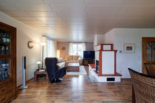 Wohnbereich mit Kachelofen - 