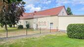 Blick vom Nachbargrundstück - Zweifamilienhaus mit Sommerküche, Werkstatt & Garten