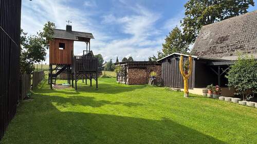 Garten mit Spielhaus - 