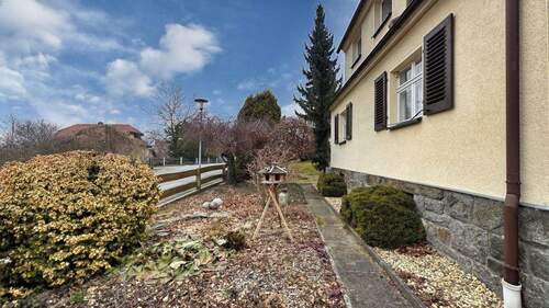 Vorgarten - Einfamilienhaus mit 104,00 m&sup2; in Großpostwitz zum Kaufen