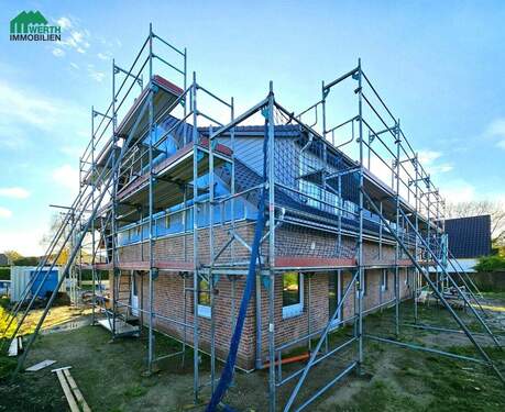 Nord-Westseite - KfW-40-Doppelhaushälfte in 25885 Ohrstedt. 20 Minuten von Husum