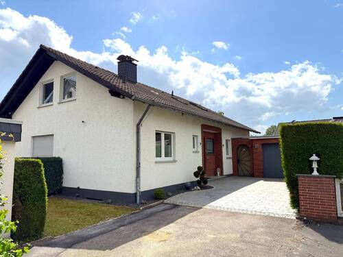 Haus - Gepflegtes Einfamilienhaus mit traumhaftem Gartengrundstück in ruhiger Lage