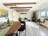 Wohnzimmer mit Kaminofen - 3 Zimmer Einfamilienhaus in Horhausen