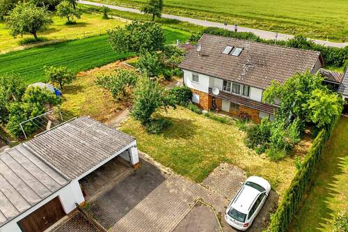 Haus und Garage Süd - Grundstück in Gärtringen