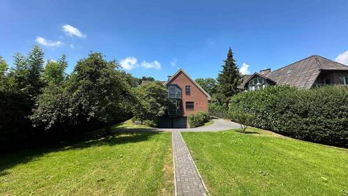 Titelbild - Rarität: Architektenhaus mit Einliegerwohnung und Tiefgarage auf großem Grundstück in Haselau