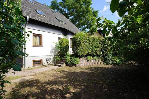 Hinter dem Haus / Terrasse - 