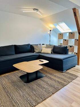 Wohnzimmer (2) - Modernisierte Wohnung im Wiesbadener Zentrum mit besonderer AfA