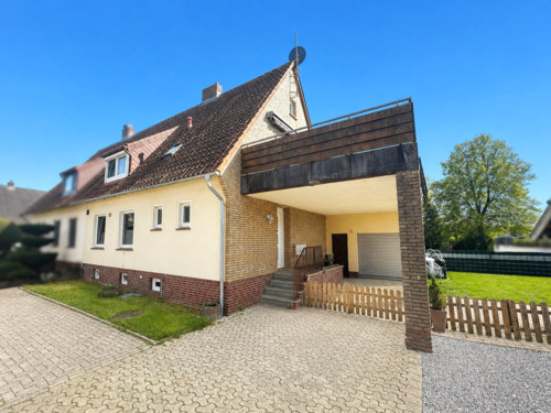 Titelbild - Charmante Doppelhaushälfte mit Dachterrasse und Garage in Brake - Wohnen in Wesernähe