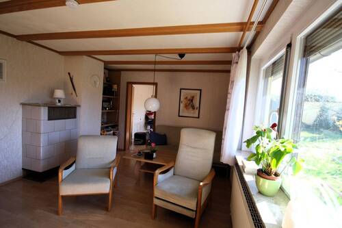 Wohnzimmer mit Kachelofen - 