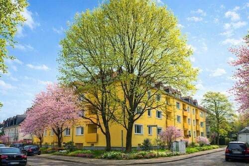 00_Aussenansicht_(KI) - Stilvolle Dachgeschosswohnung mit Loggia und Blick auf den Tiroler Platz!