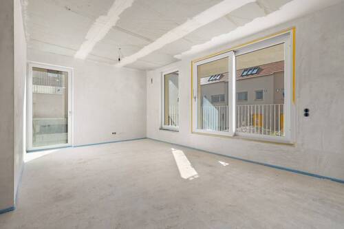 Wohn-Esszimmer mit Zugang zum Balkon - Mehrfamilienhaus, Wohnhaus in Freckenfeld zum Kaufen