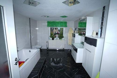 Bad OG vermietetes Haus - 