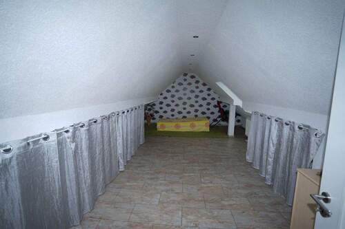 Dachraum DG vermietetes Haus - 