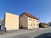 Straßenansicht - 1 Zimmer Mehrfamilienhaus, Wohnhaus zum Kaufen in Glaubitz