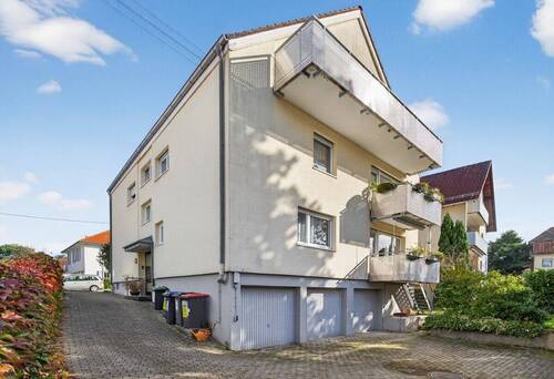 Einfahrt - Etagenwohnung mit 101,00 m² in Karlsruhe / Weiherfeld-Dammerstock zum Kaufen