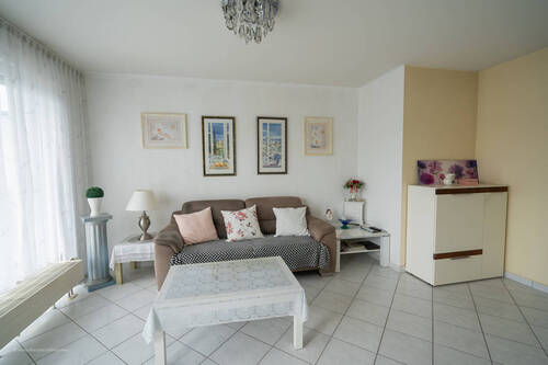 Wohnzimmer - Etagenwohnung mit 78,40 m² in Unterhaching zum Kaufen