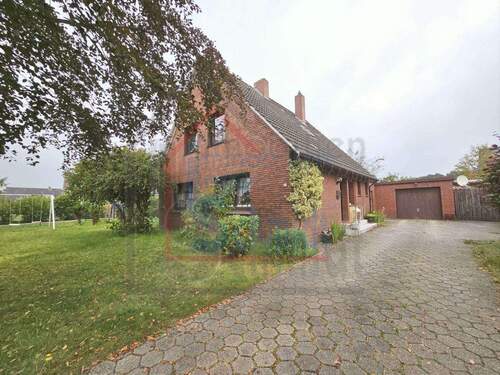 Straßenansicht - 4 Zimmer Einfamilienhaus zum Kaufen in Weener