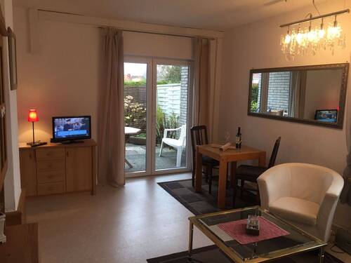 Eine Erdgeschosswohnung mit Terrasse - 