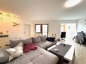 Wohnzimmer zum Wintergarten hin - 2 Zimmer Terrassenwohnung zur Miete in Langenzenn