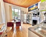 Großzügige Wohn- und Essküche mit Zugang zur Terrasse - Attraktiv vermietete 2-Zimmer-Wohnung in Düsseldorf-Unterbilk mit hohem Wertsteigerungspotenzial!