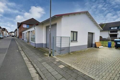 15109621_2-Garage_ Stellplatz - Mehrfamilienhaus, Wohnhaus mit 194,00 m&sup2; in Schaafheim zum Kaufen