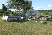 Gewächshaus und Hochbeete - 