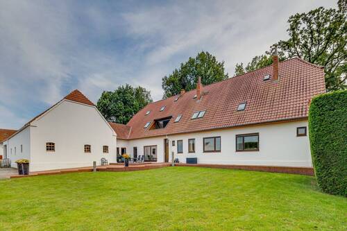 Rückansicht - 1 Zimmer Mehrfamilienhaus, Wohnhaus in Oyten