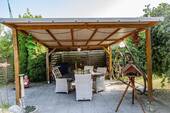 Überdachte Sitzecke im Garten - Einfamilienhaus mit 92,00 m&sup2; in Iserlohn zum Kaufen