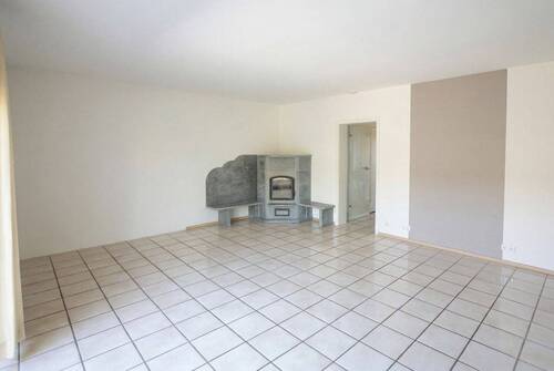 Wohnzimmer mit Specksteinofen - 