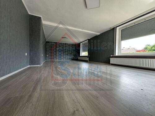 Wohnzimmer - Einfamilienhaus mit 120,00 m&sup2; in Weener zum Kaufen