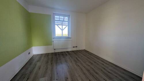 Schlafzimmer in Wohnung 2 im EG - 