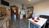 Küche - 9 Zimmer Mehrfamilienhaus, Wohnhaus zum Kaufen in Steinfeld
