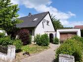 Hausansicht mit Garage - 6 Zimmer Einfamilienhaus zum Kaufen in Wittmar
