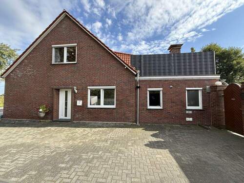 Seitenansicht - Mehrfamilienhaus, Wohnhaus mit 251,00 m² in Wangerland / Horum zum Kaufen