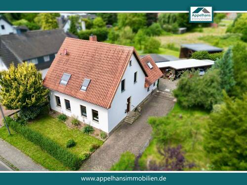 Hausansicht vorne - Ein Zuhause mit Herz - Ihr neues Refugium am Mittellandkanal