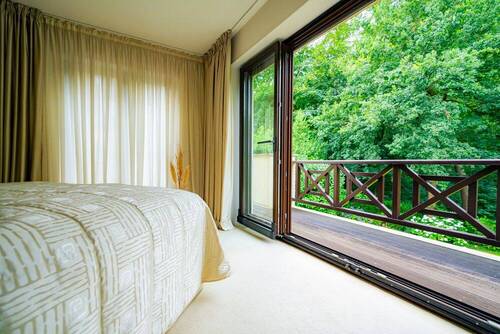 Schlafzimmer mit Zugang zur Dachterrasse - 