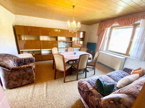 Wohnzimmer - 7 Zimmer Doppelhaushälfte in Laußnitz
