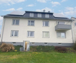 Rückseite mit Solaranlage - Mehrfamilienhaus, Wohnhaus zum Kaufen in Langelsheim