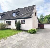 Doppelhaushälfte in ruhiger Lage von Moorrege mit flexibler Raumaufteilung und Garten