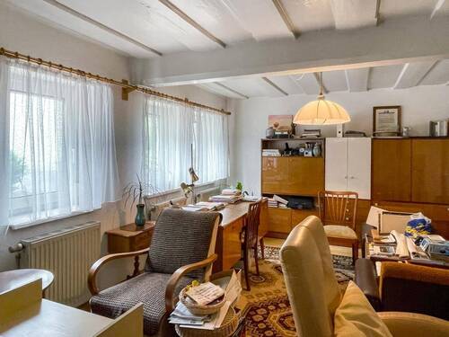 Wohnzimmer EG - 5 Zimmer Einfamilienhaus zum Kaufen in Wurzbach