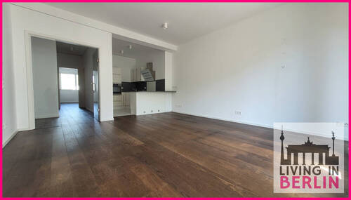 Wohnzimmer mit offener Küche - 