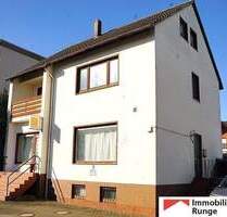 Zweifamilienhaus mit zwei rechtlich getrennten Einheiten bzw. Ladenlokal mit einer Wohnung in Bennigsen - Springe