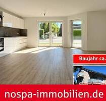 Neuwertige 3-Zimmer Eigentumswohnung mit PKW-Stellplatz und Terrasse im 