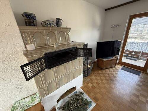 Wohnzimmer mit Kachelofen Hinterhaus - 