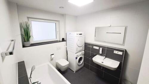 Badezimmer - Terrassenwohnung mit 102,00 m&sup2; in Feucht zum Kaufen