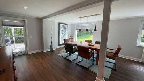 Esszimmer mit Zugang zur Terrasse - 6 Zimmer Einfamilienhaus in Handewitt