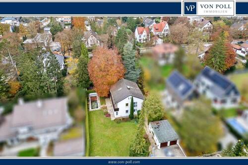 Titel Haus - Charmantes Einfamilienhaus in begehrter Lage von Gräfelfing mit Südgarten und Pool