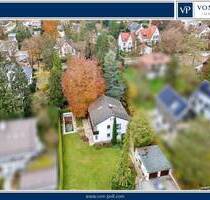 Charmantes Einfamilienhaus in begehrter Lage von Gräfelfing mit Südgarten und Pool