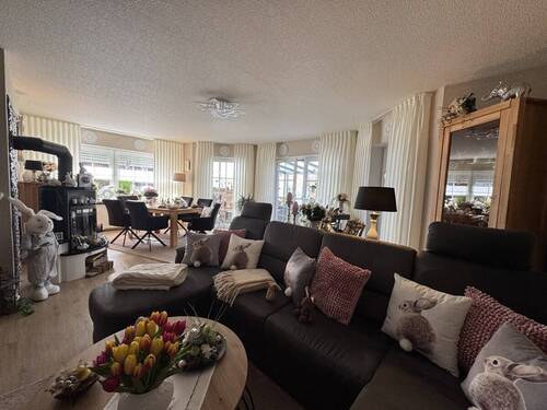 Wohnzimmer - Einfamilienhaus mit 125,40 m&sup2; in Schortens zum Kaufen