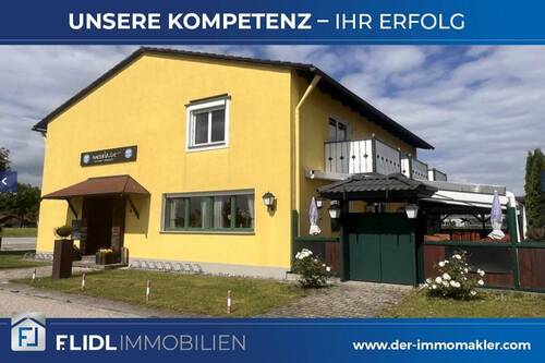 Bild 1 - Mehrfamilienhaus mit 4 Wohnungen und einem Gastrobetrieb